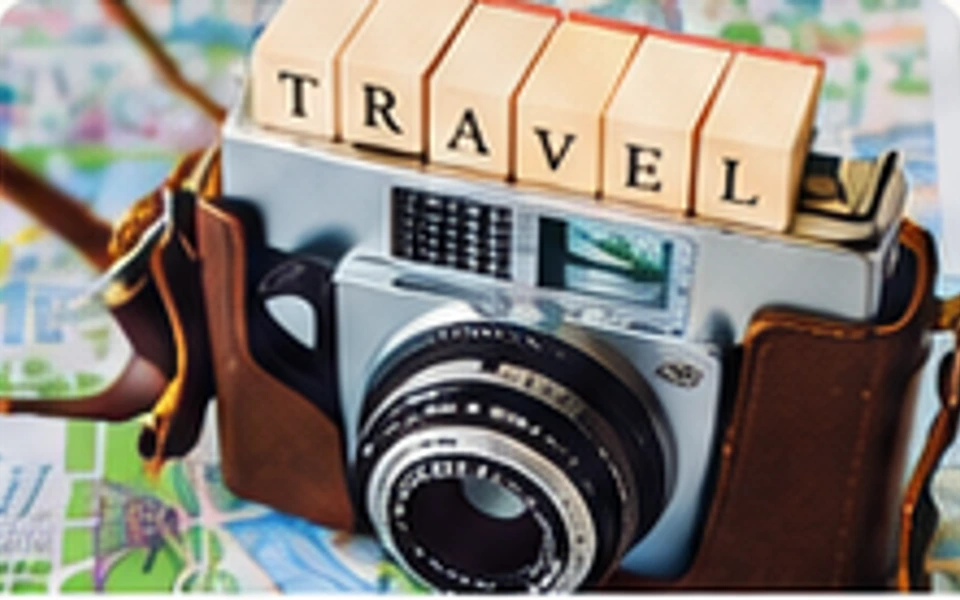 A camera and travel letter tiles